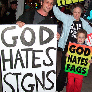 protesters with "God hates fags" signs