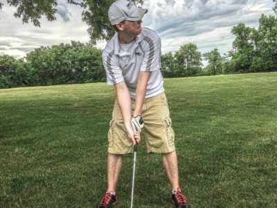 golfer dresses the ball