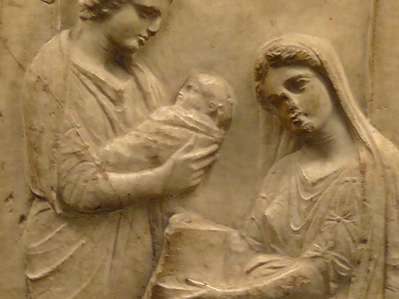 Stone art of women with baby