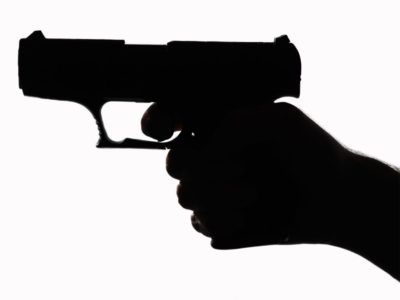 hand holding a pistol