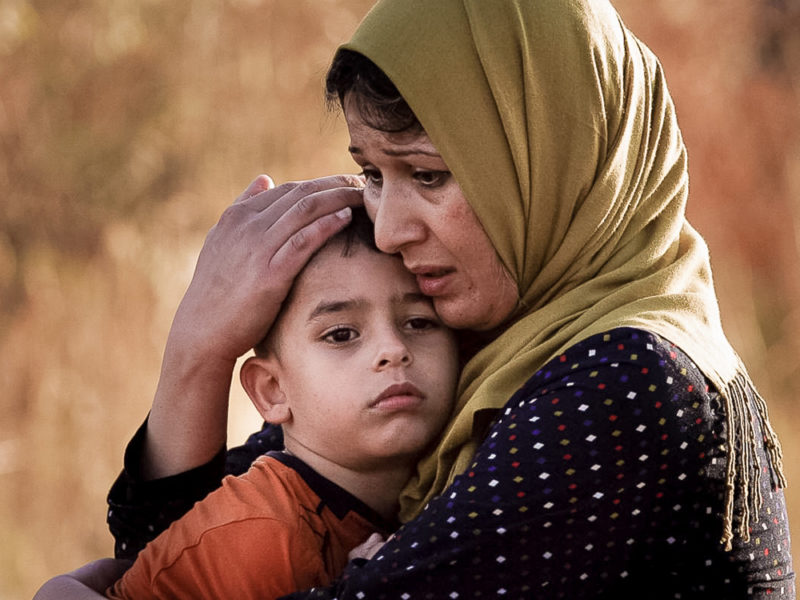 Syrian refugee woman and child