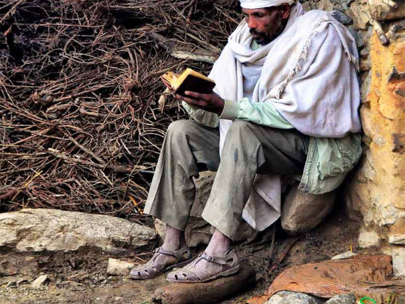 Ethiopian Christian reading Bible