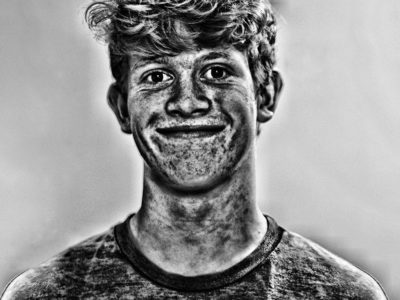 Pencil art of young man smiling
