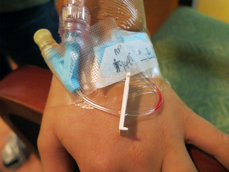 IV in a hand.